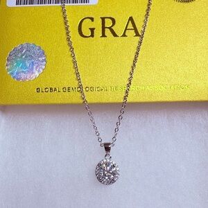 Silver women’s necklace w/ certified 1ct. Moissanite diamond pendant